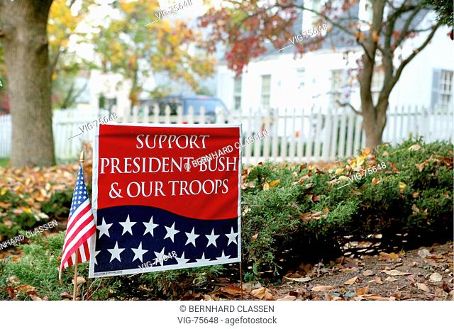 Presidential election in the United States. Sign - Support President Bush and our troops - in a front garden of a house in Washington DC. George W