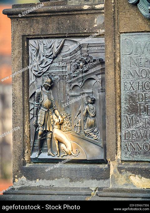 Tradition says that if you rub and touch the bronze plaque is supposed to bring good luck and ensure your return to Prague