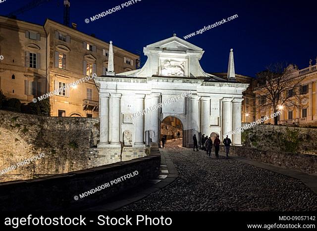Porta San Giacomo in rosy white mark, the most monumental of the four entrance gates from the Venetian walls to the upper city, shooting in the evening