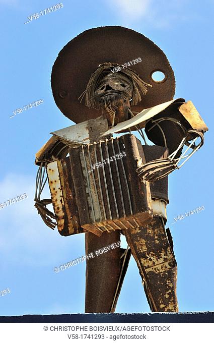 Mexico, Baja California, Todos Santos, Hotel California, Wrought iron sculpture of an accordionist