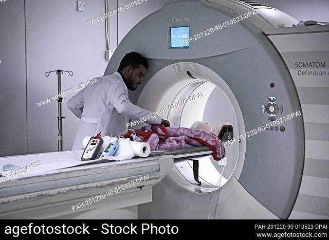 20 December 2020, Yemen, Sanaa: Conjoined twin male babies undergo a magnetic resonance imaging (MRI) at al-Sabeen hospital in Sanaa