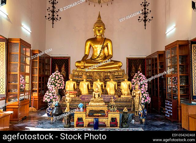 Golden Buddhas in four pavilions called Vihara, situated in the Wat Pho temple in Bangkok