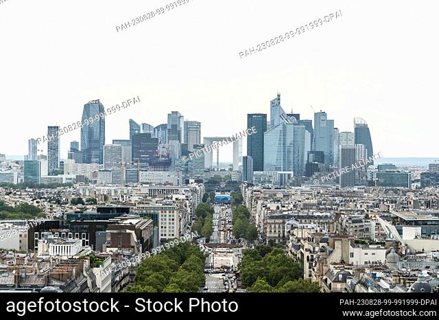 SYMBOL - 23 August 2023, France, Paris: View from Arc de Triomphe de l'Étoile to La Défense banking district. Photo: Silas Stein/dpa