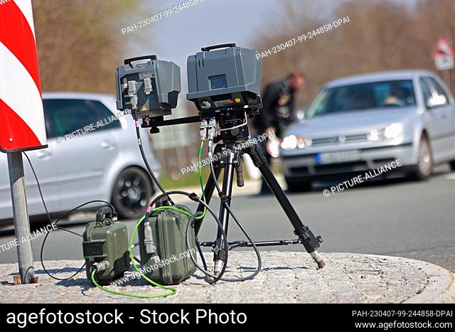07 April 2023, Saxony-Anhalt, Rübeland: A traffic measuring device stands on the L 96 at the Rappbode Dam. Supporters of the car tuning scene from all over...
