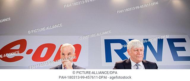 13 March 2018, Germany, Essen: Rolf Martin Schmitz (R), chairman of the board of RWE, and Johannes Teyssen, chairman of the board of E