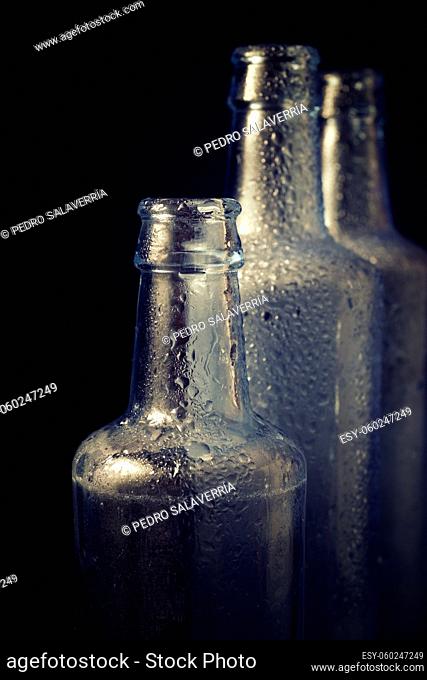 Glass bottles on a table