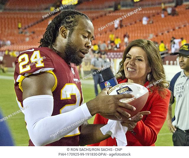 Washington Redskins cornerback Josh Norman (24) is interviewed by NBC sideline reporter Michele Tafoya following the game against the Oakland Raiders at FedEx...