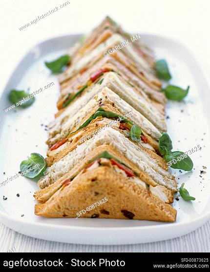 Assorted sandwiches (tramezzini) in a row
