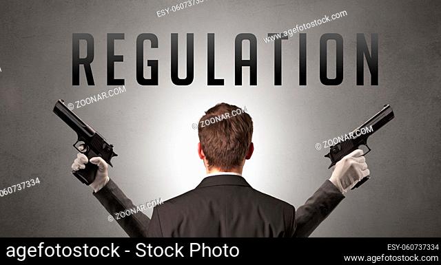 Rear view of a businessman with REGULATION inscription, cyber security concept