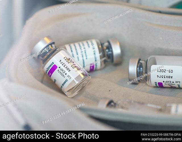 25 February 2021, Rhineland-Palatinate, Mainz: Empty vials of AstraZeneca's Corona vaccine lie in a tray at a police vaccination center at the start of...