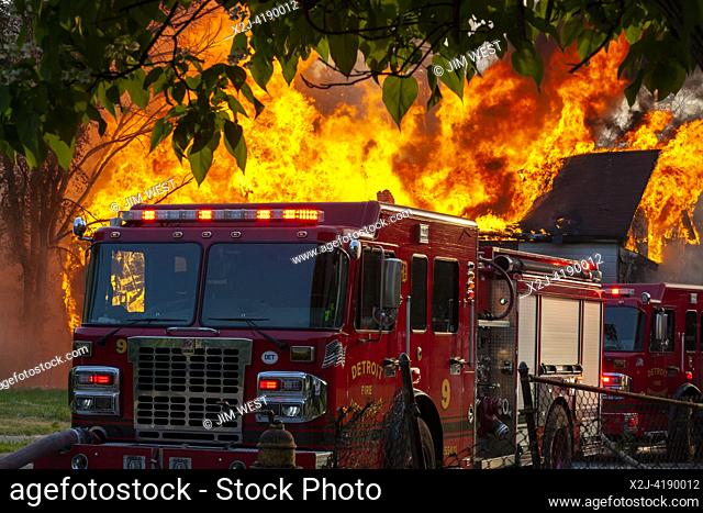 Detroit, Michigan USA - 10 June 2023 - An abandoned house burns on the near east side of Detroit, an apparent arson