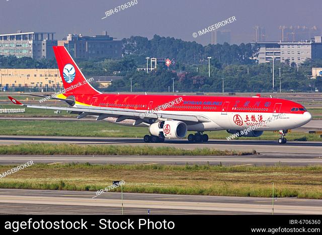 An Airbus A330-300 aircraft of Sichuan Airlines with registration number B-5923 and Wuliangye special livery at Guangzhou Airport, China, Asia