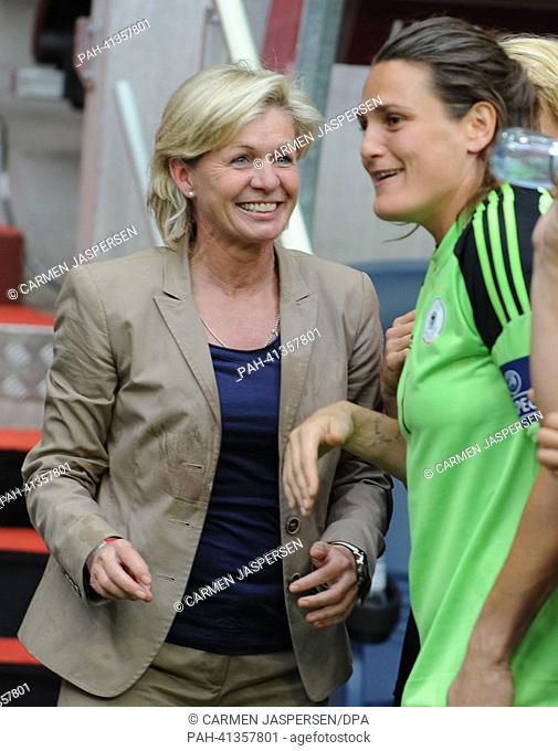 Head Coach Silvia Neid (L) and Nadine Angerer of Germany celebrate after winning the UEFA Women«s EURO 2013 final soccer match between Germany and Norway at the...