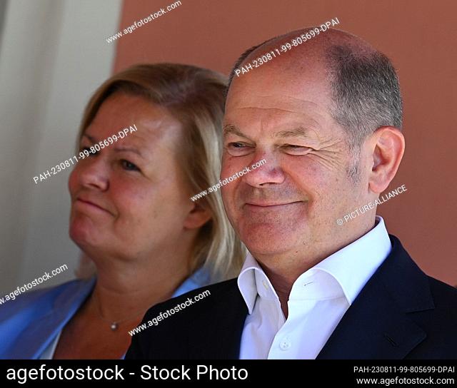 11 August 2023, Hesse, Wiesbaden: Chancellor Olaf Scholz and Federal Minister of the Interior Nancy Faeser (both SPD) will take part in a meeting with...