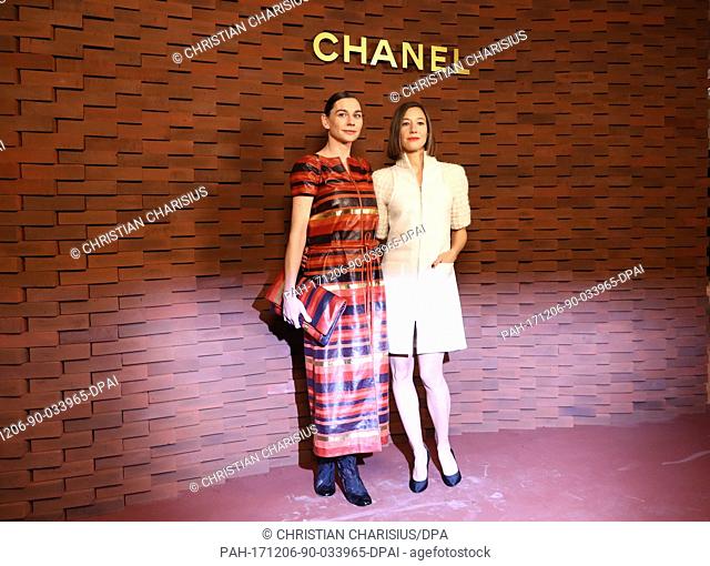 The actresses Christiane Paul and Johanna Wokalek (R) arrive at the photo call at the Elbe Philharmonic Hall in Hamburg, Germany, 06 December 2017