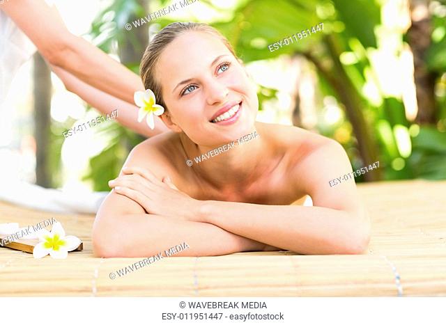 Attractive woman getting massage on her back