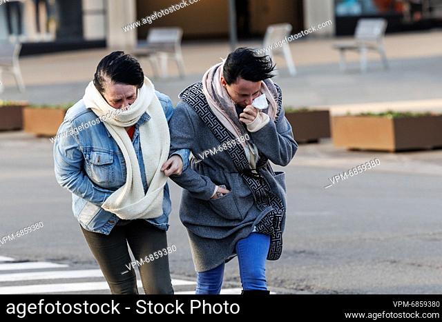 Illustration picture shows people walking through high winds, in Oostende as storm Corrie hits the Belgian coast of the North Sea, Monday 31 January 2022