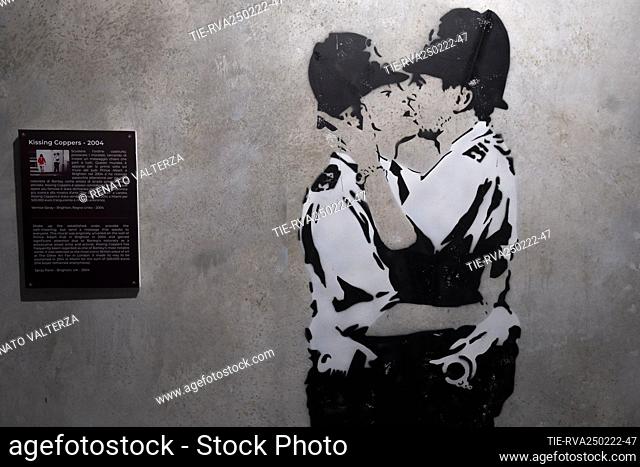 Artwork 'Kissing Coppers' 2004 at the exhibition 'The world of Banksy' at the station Torino Porta Nuova. The exhibition itinerary presents over 90 works of...