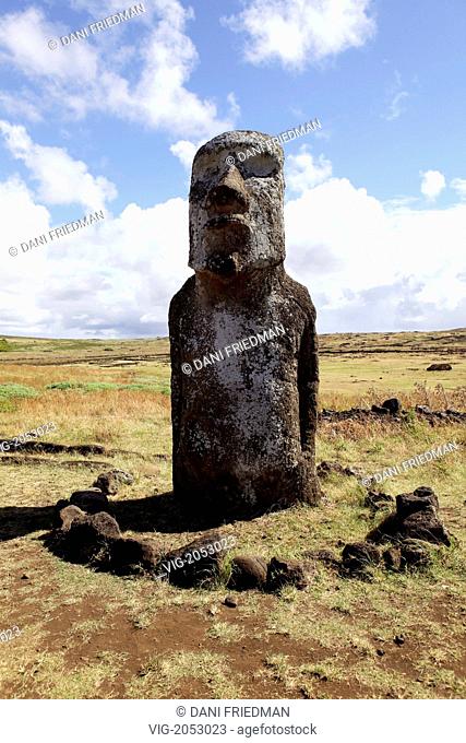 A Moai at Ahu Tongariki encircled with stones. This original Moai was the brought to Japan for an expo and later returned to Easter Island where it now stands...