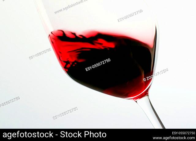 Winery, cheers and winemaking concept - Glass of red wine, pouring drink at luxury holiday tasting event, quality control splashing liquid motion background for...