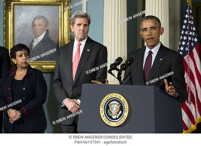 From left to right: United States Attorney General Loretta Lynch, left, and US Secretary of State John Kerry, center, look on as US President Barack Obama makes...