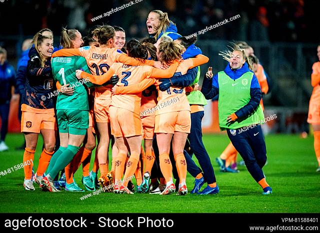 Dutch players celebrate after winning a soccer match between Belgium's national women's team the Red Flames and the Netherlands