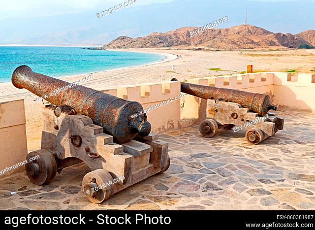 fort battlesment sky and  star brick in oman muscat the old defensive sea mountain