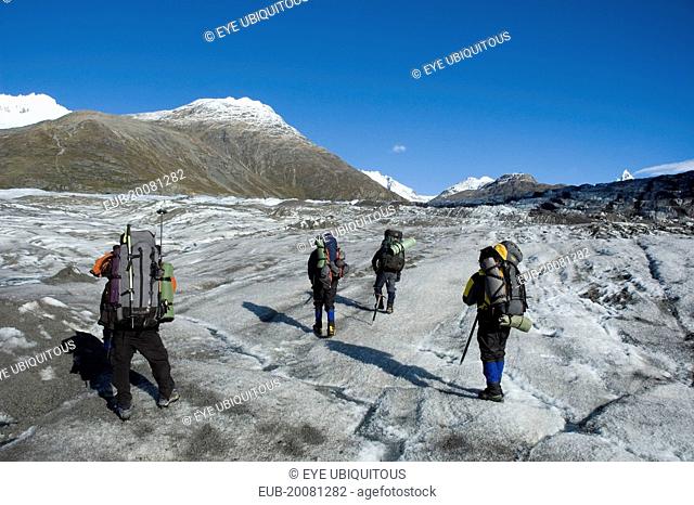 Mountaineers crossing Glacier Chico in the O'Higgins region of Patagonia. Trek from Glacier Chico (Chile) to El Chalten (Argentina)