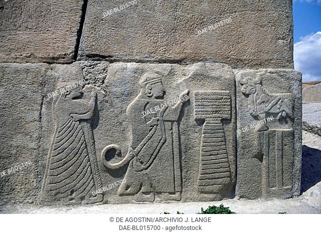 A king and a queen before an altar and the bull of the storm god, relief orthostates near the Sphinx Gate, Alacahoyuk, Turkey