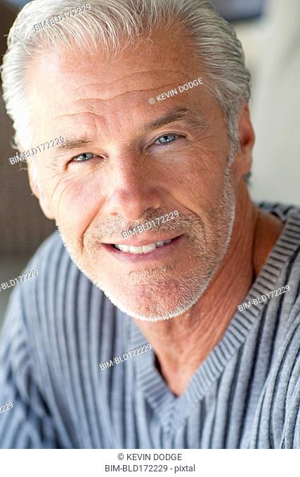 Close up of Caucasian man smiling