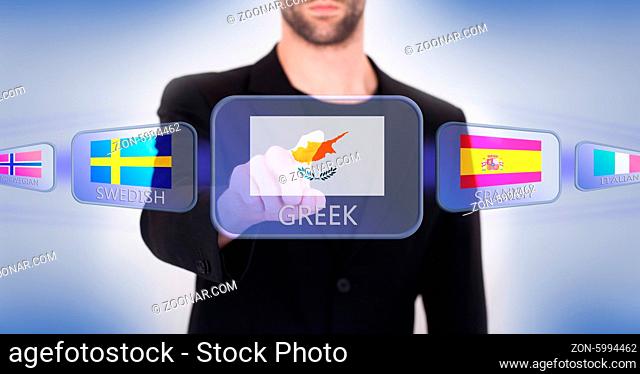 Hand pushing on a touch screen interface, choosing language or country, Cyprus