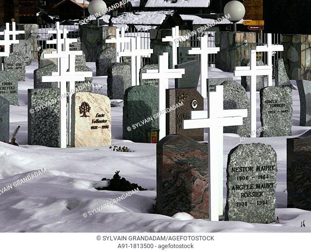 Switzerland, Valais, Val d'Herens, village of Mase in winter, the cemetery