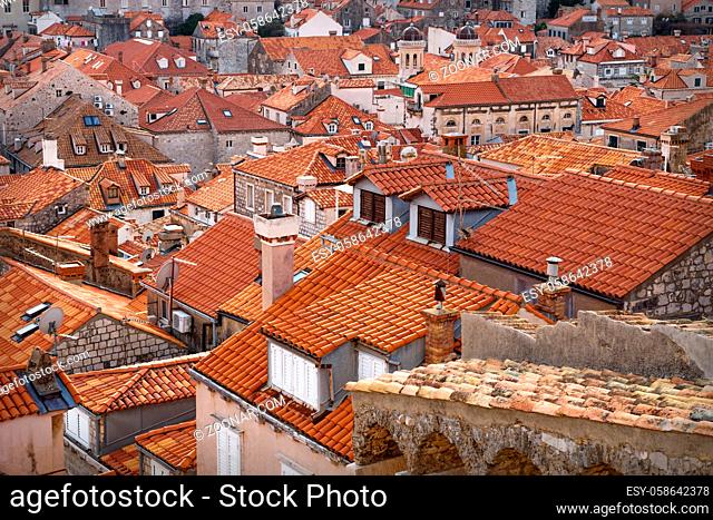 Detail of the orange ancient roofs of Dubrovnik shined by sunslight, Croatia