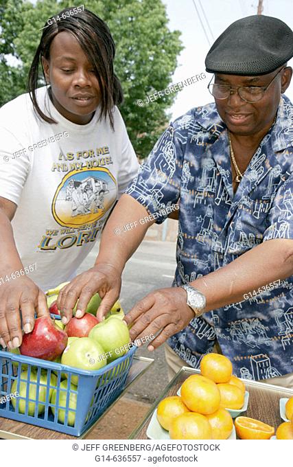 4th Avenue District, street fruit vendor, Black male. Birmingham. Alabama. USA