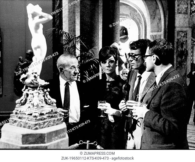 Jan. 12, 1965 - Paris, France - Irish actor PETER O'TOOLE (b. 8/2/1932), WILLIAM WYLER and AUDREY HEPBURN at a cocktail party held at Boulogne studio in France...