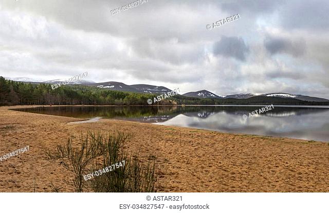 Water reflection at Loch Morlich in Scotland