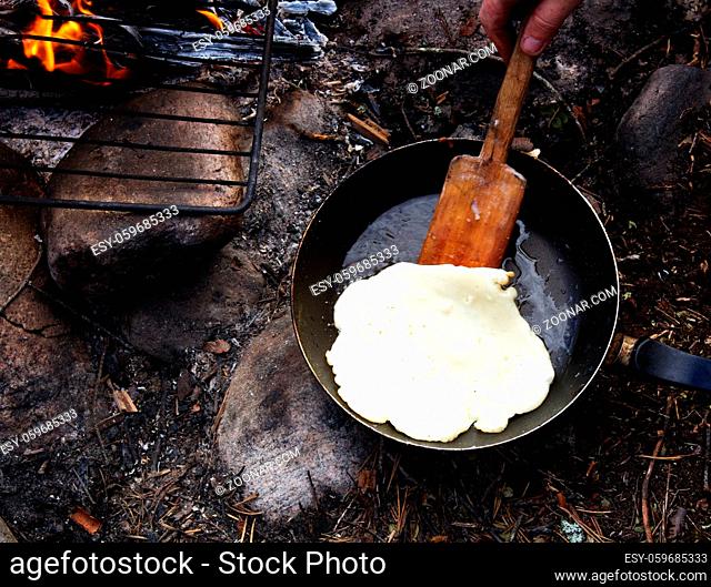 festival week before Lent. festival is held outdoors, pancakes are baked on fire