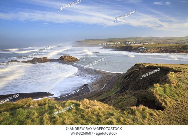 The breakwater at Bude, on the north coast of Cornwall, captured from cliffs on the South West Coast Path
