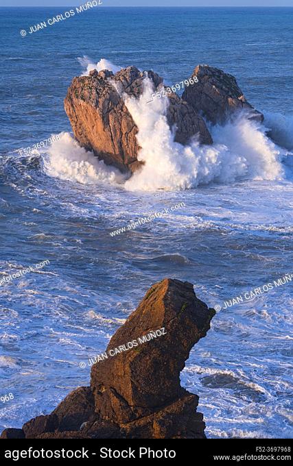 Swell in the Cantabrian Sea. Big waves in the so-called ""Puerta del Cantabrico"" on the cliffs of Liencres. Municipality of Piélagos in the Autonomous...