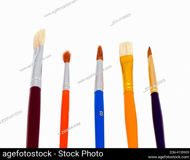 various different colorful new art paint brushes isolated on white background