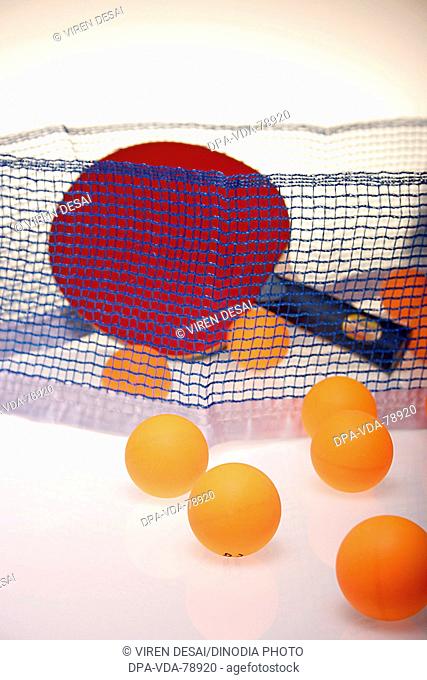 Table tennis balls with racket and net