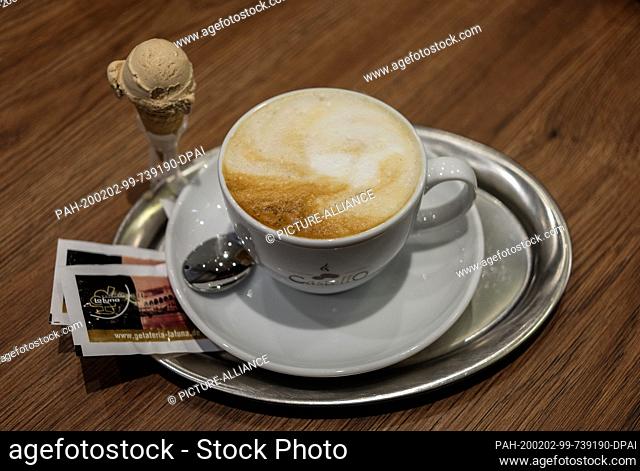31 January 2020, Berlin: A cup of cappuccino and a mini ice-cream cone. Photo: Jens Kalaene/dpa-Zentralbild/ZB. - Berlin/Berlin/Germany