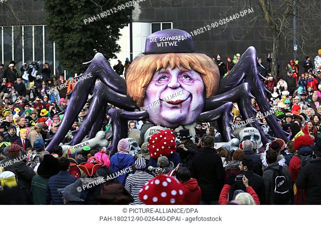 A political caricature float featuring ""German Chancellor Angela Merkel of the Christian Democratic Union, as a black widow spider"" takes part in the...