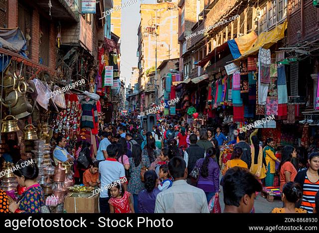 Kathmandu, Nepal - October 16, 2014: Busy shopping street in Thamel district