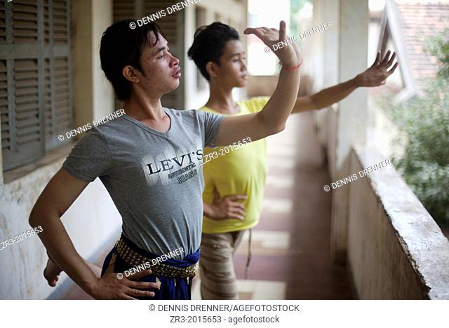 Young dancers practice traditional Cambodian dance which they perform at the National Museum in Phnom Penh, Cambodia