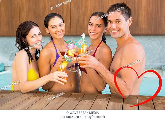 Composite image of cheerful people toasting drinks in the swimming pool