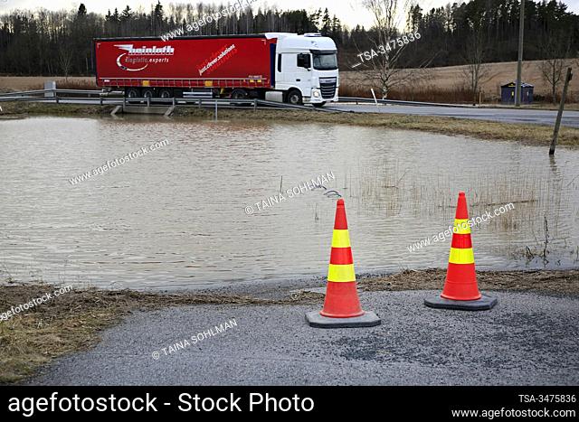 Pernion asema, Salo, Finland, February 23, 2020. Pernionjoki flooding into highway 52 underpass, almost reaching the road