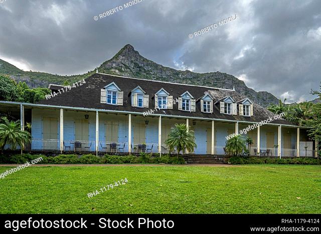 Clouds on mountains over Eureka La Maison Creole house and garden, Moka, Mauritius, Indian Ocean, Africa