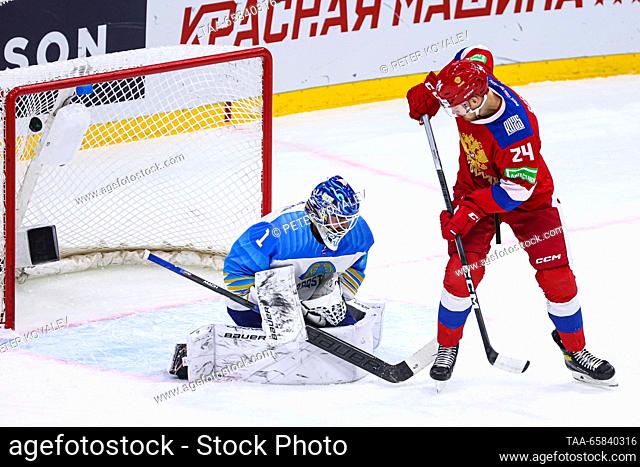 RUSSIA, ST PETERSBURG - DECEMBER 17, 2023: Kazakhstan's goaltender Nikita Boyarkin (L) and Russia 25's Ilya Sfonov in action in their 2023 Channel One Cup ice...