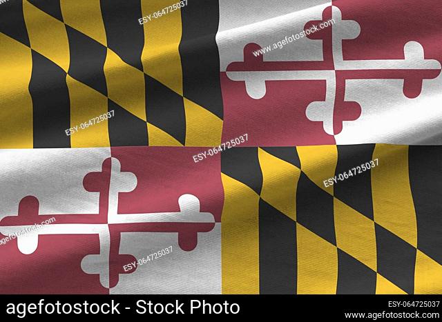 Maryland US state flag with big folds waving close up under the studio light indoors. The official symbols and colors in fabric banner